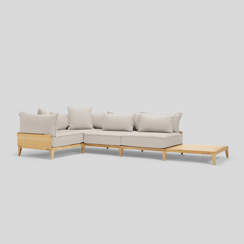 A studio photo of Bluff Sectional with End Table Sunbrella Parchment / Four Piece with In-line End Table