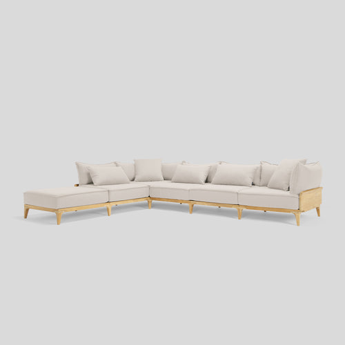 A studio photo of Bluff Chaise Sectional Sunbrella Parchment / Five Piece with Chaise