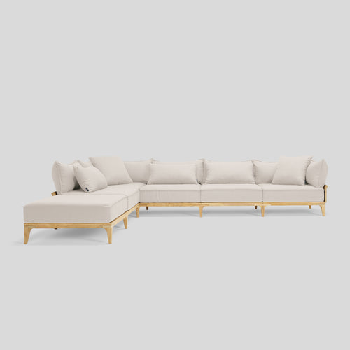 A studio photo of Bluff Chaise Sectional Sunbrella Parchment / Five Piece with Chaise