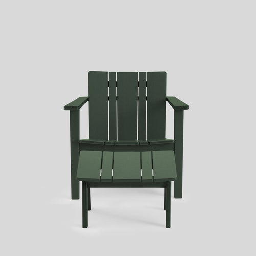 A studio photo of Low Chair Green / Chair + Ottoman