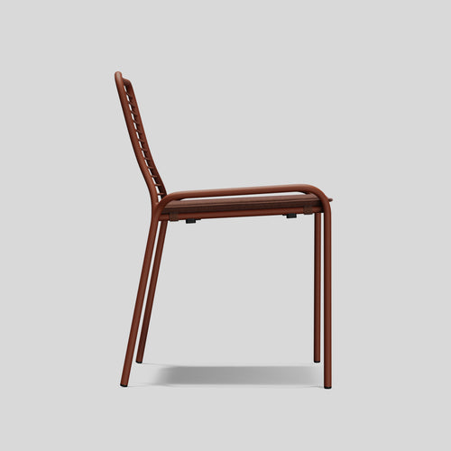 A studio photo of XY Dining Chair (Set of 2) Rust / Armless
