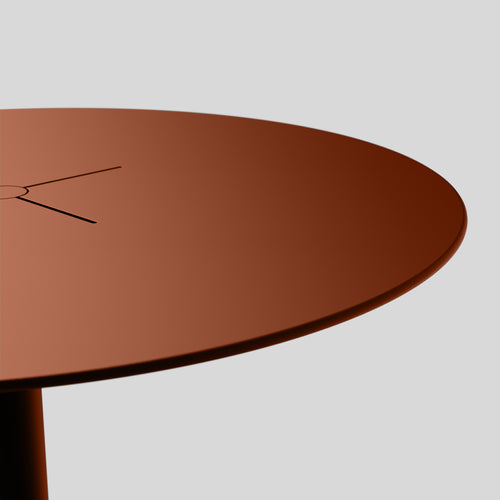 A studio photo of XY Round Dining Table Rust